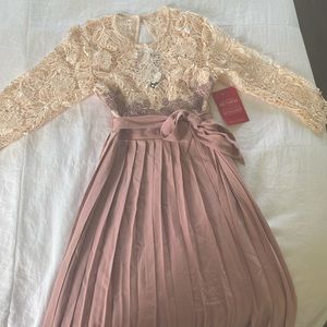 Maternity dress- never worn! Brand new.  Beautiful.